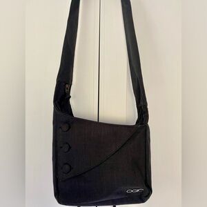Crossbody Bag with padded zippered iPad pocket.